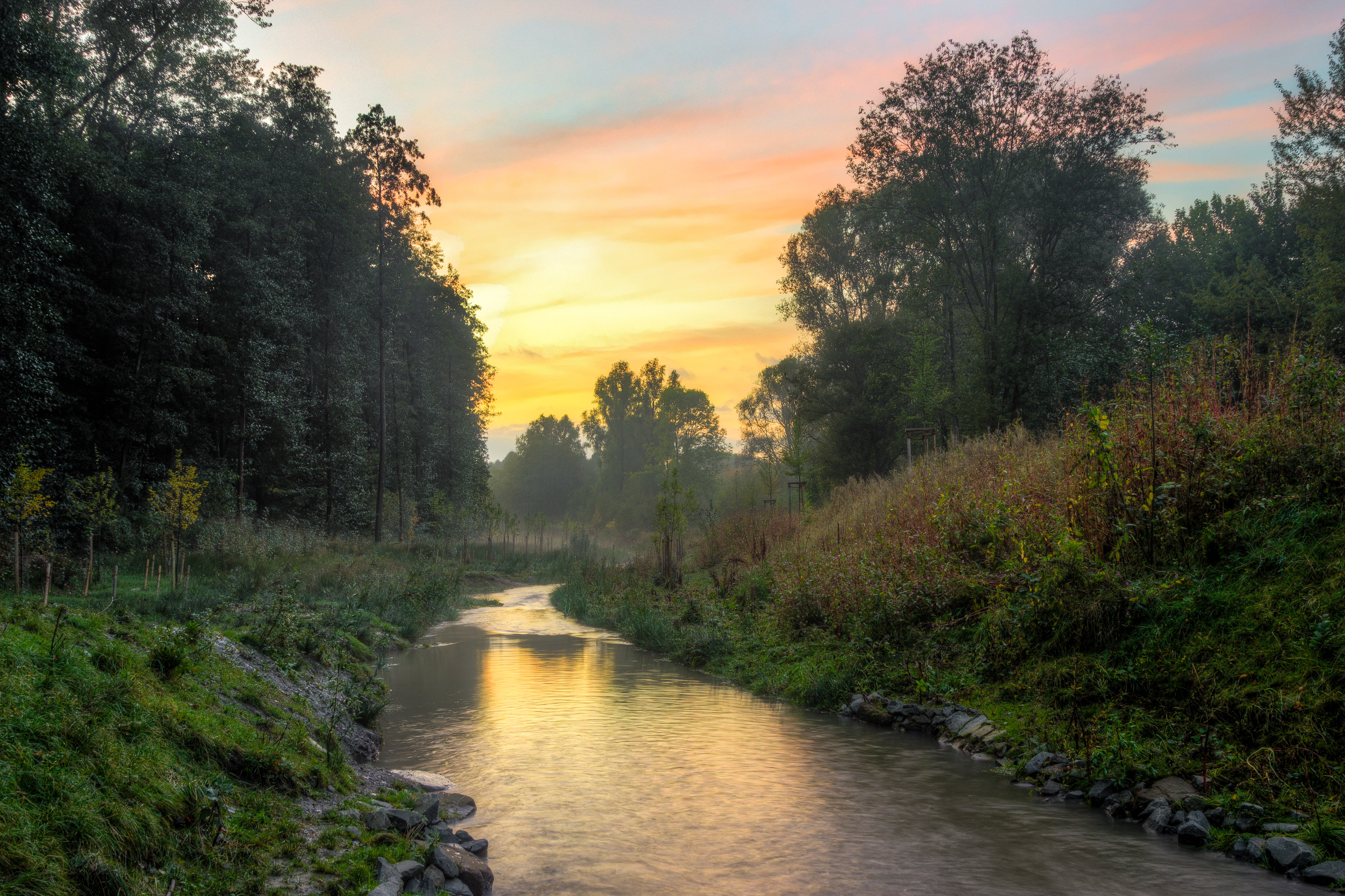 The Emscher river in the northern Ruhr region — the linear open-air venue of Emscherkunst — under its long renaturalisation programme from open sewer back to a near-natural waterway.