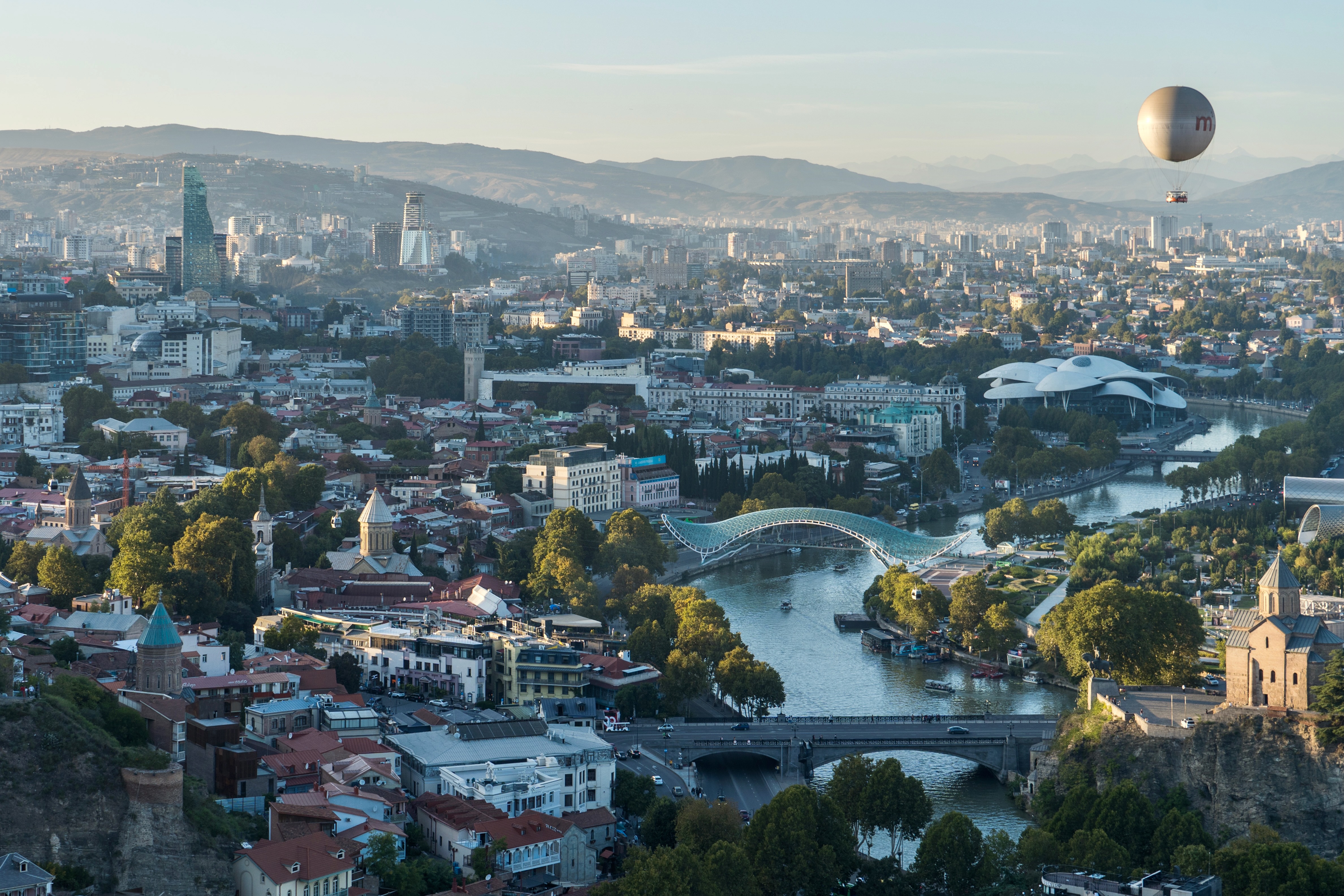 Panorama of Old Tbilisi, the Georgian capital — the city across which the Tbilisi Triennial has operated since 2012, with venues distributed from the historic centre to the post-industrial periphery.