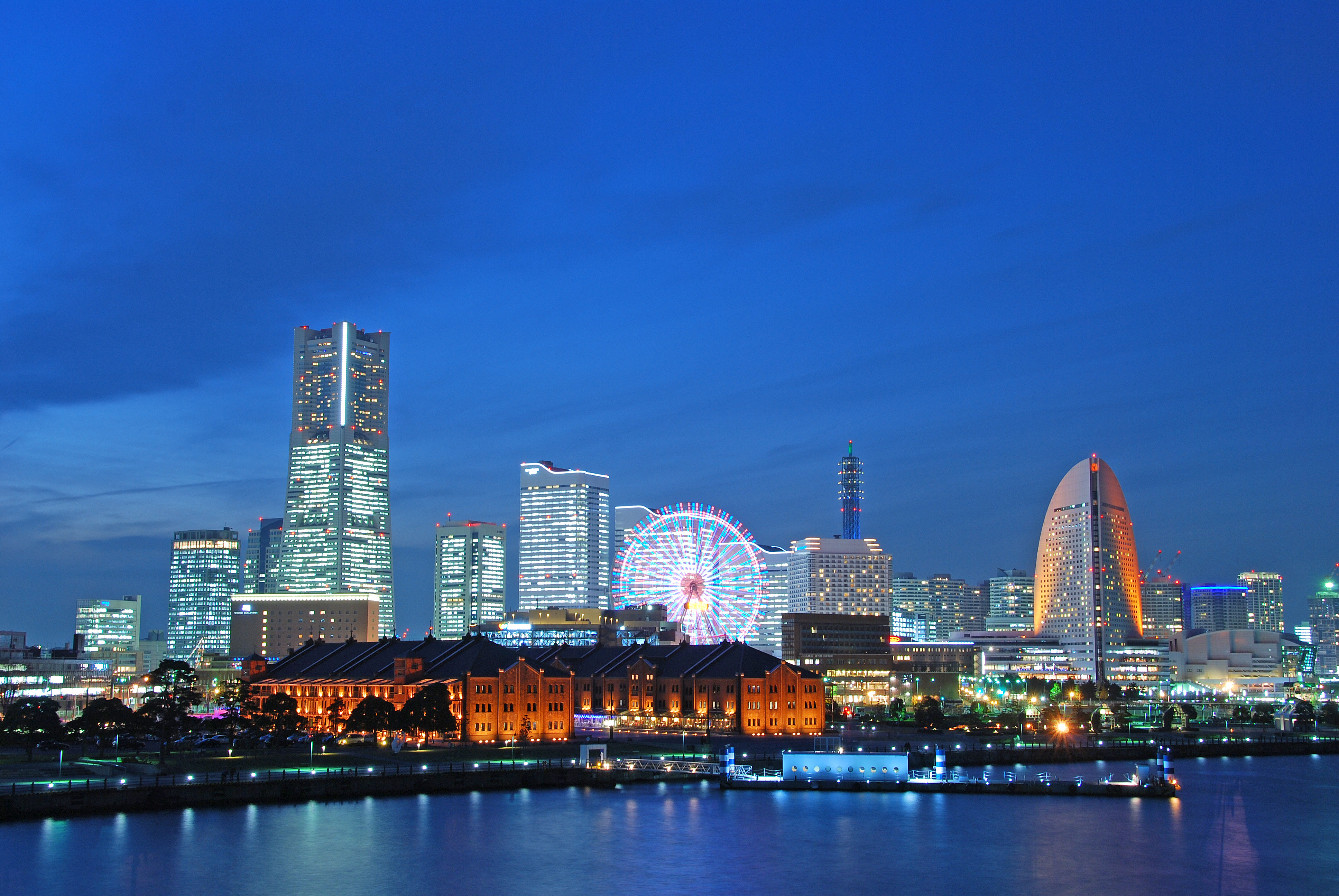 The Minato Mirai 21 waterfront in Yokohama — the post-industrial harbour development that has anchored the Yokohama Triennale since 2001.