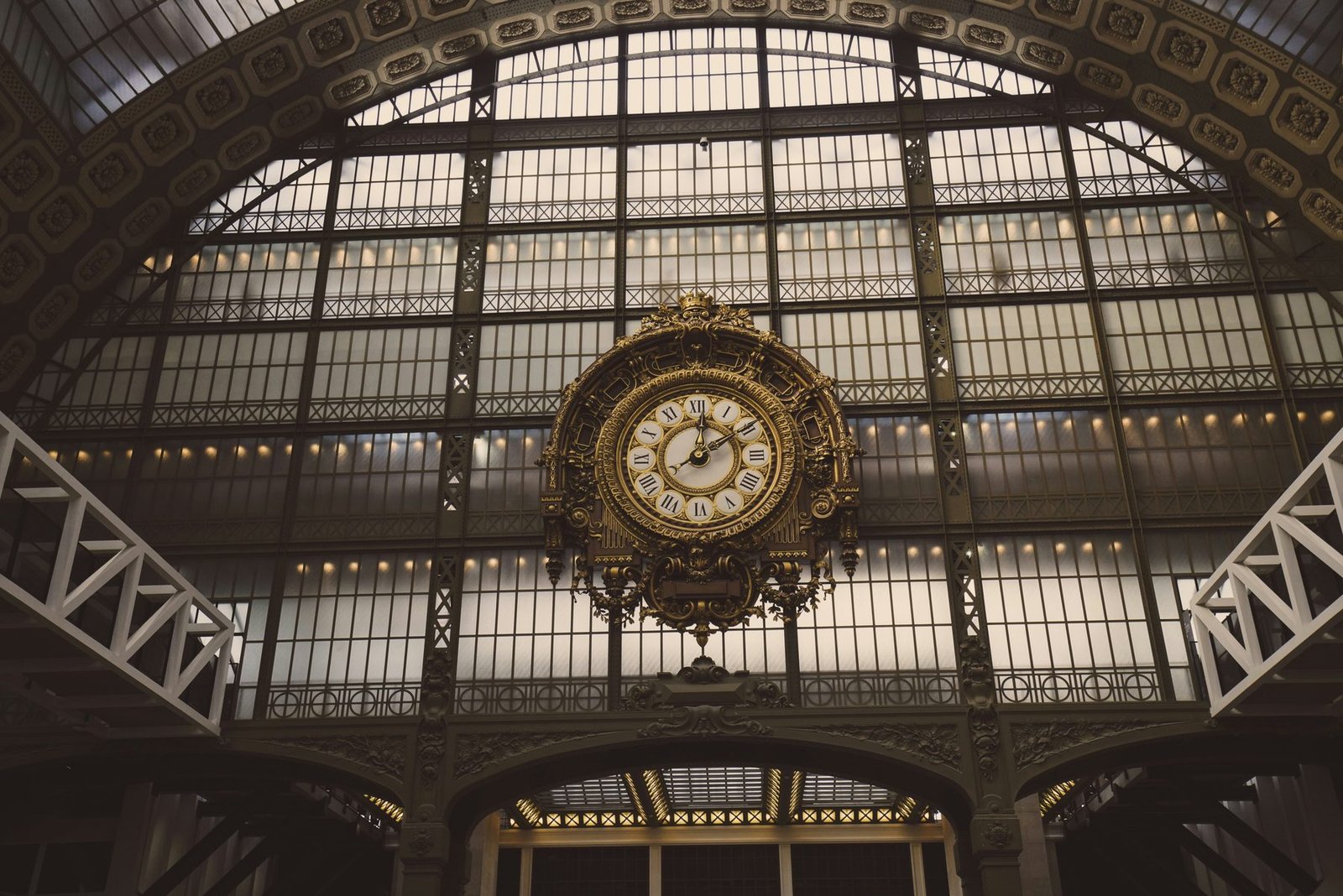 The large clock inside the glass-roofed hall of the Musée d’Orsay